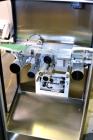 Used Thermo Ramsey Icore AutoCheck 9000 Plus Automatic Belt Checkweigher with worm screw infeed and reject system. Capable of speeds up to 550 containers per minute. Accuracies of +/- 50mg. Has a wei...