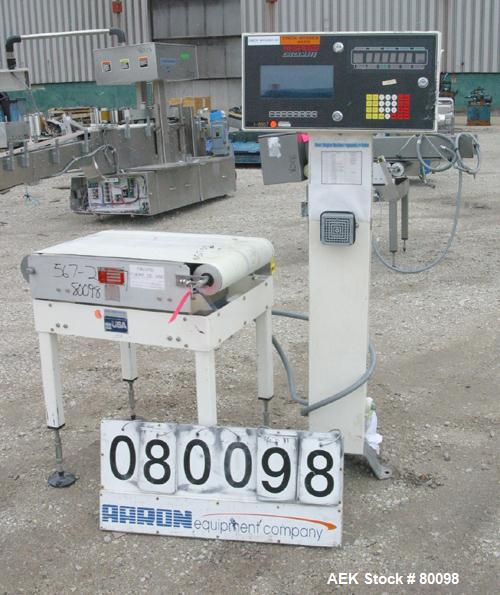 Used Hi-Speed model CS80MM-CS Checkmate high speed belt and scale weigh machine, 18" wide belt, serial #10600. Weight range is 1lb-15lbs at 15 packages per minute.