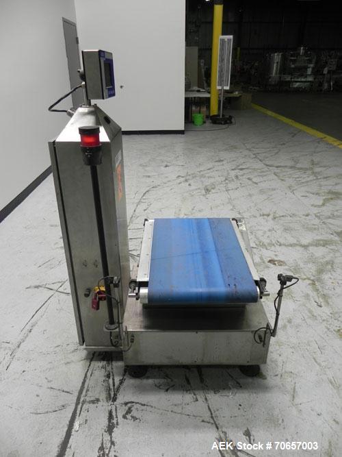 Used Lock Model WeighChek CK-50 Full Case Checkweigher. Machine has a maximum speed of up to 10 cases per minute (depending on case size). Has a weight range of 1,000 - 40,000 g with an accuracy rati...
