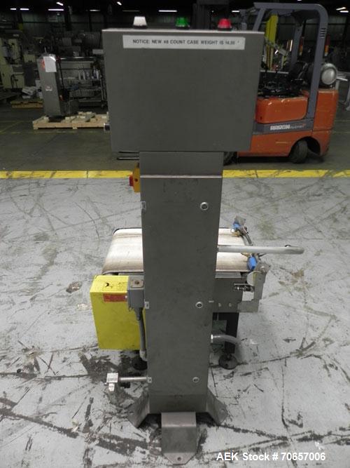 Used Mettler Toledo Hi-Speed Model CS 3400 GT-MM Full Case Check Weigher. Machine has a weight capacity of 10-15lbs. This unit is designed to handle cases, belt dimension 18" wide X 30" long.