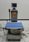 Used Lock Model WeighChek CK-50 Full Case Checkweigher. Machine has a maximum speed of up to 10 cases per minute (depending on case size). Has a weight range of 1,000 - 40,000 g with an accuracy rati...