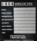 Used Lock Model WeighChek CK-50 Full Case Checkweigher. Machine has a maximum speed of up to 10 cases per minute (depending on case size). Has a weight range of 1,000 - 40,000 g with an accuracy rati...