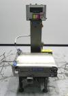 Used Mettler Toledo Hi-Speed Model CS 3400 GT-MM Full Case Check Weigher. Machine has a weight capacity of 10-15lbs. This unit is designed to handle cases, belt dimension 18