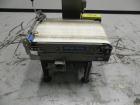 Used Mettler Toledo Hi-Speed Model CS 3400 GT-MM Full Case Check Weigher. Machine has a weight capacity of 10-15lbs. This unit is designed to handle cases, belt dimension 18