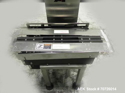 Used Alpha (All-Fill) Model CW-10 Checkweigher. Capable of speeds up to 300 packages per minute. Can handle package weights up to 10 lbs with dimensions up to 15" (long) X 10" (wide). Is rated with a...