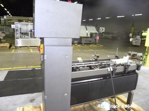 Used Hi-Speed Checkweigher, Model MM. Conveyor consists of8" wide x 12" long belt infeed, adjustable width plastic silent chain 9"L stationary, 10" long load cell and 14" wide staionary, 8" wide x 12...