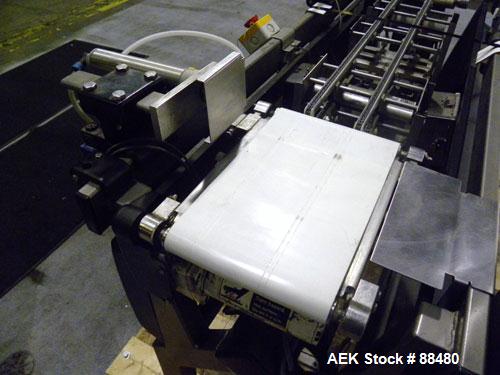 Used Hi-Speed Checkweigher, Model MM. Conveyor consists of8" wide x 12" long belt infeed, adjustable width plastic silent chain 9"L stationary, 10" long load cell and 14" wide staionary, 8" wide x 12...