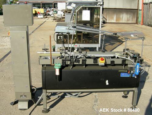 Used Hi-Speed Checkweigher, Model MM. Conveyor consists of8" wide x 12" long belt infeed, adjustable width plastic silent chain 9"L stationary, 10" long load cell and 14" wide staionary, 8" wide x 12...