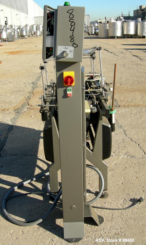 Used Hi-Speed Checkweigher, Model MM. Conveyor consists of8" wide x 12" long belt infeed, adjustable width plastic silent chain 9"L stationary, 10" long load cell and 14" wide staionary, 8" wide x 12...