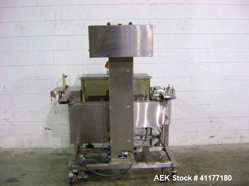 Used Hi-Speed Mettler Toledo Checkweigher, Model CM6400WD-CM. Stainless steel. Side belt driven infeed, and discharge. Approximate 36’’ chain weigh section, weight range up to 20 pounds. Capable of s...