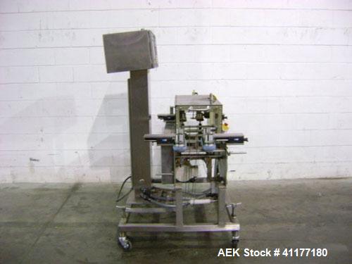 Used Hi-Speed Mettler Toledo Checkweigher, Model CM6400WD-CM. Stainless steel. Side belt driven infeed, and discharge. Approximate 36’’ chain weigh section, weight range up to 20 pounds. Capable of s...