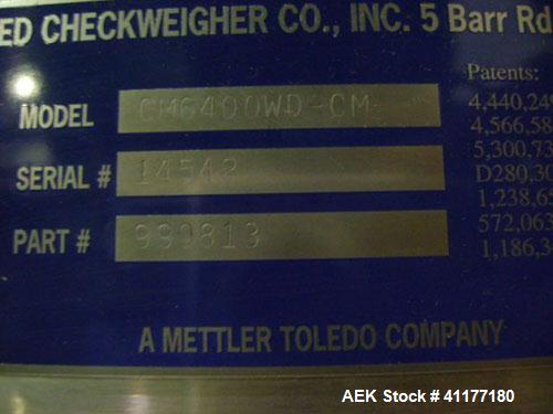 Used Hi-Speed Mettler Toledo Checkweigher, Model CM6400WD-CM. Stainless steel. Side belt driven infeed, and discharge. Approximate 36’’ chain weigh section, weight range up to 20 pounds. Capable of s...