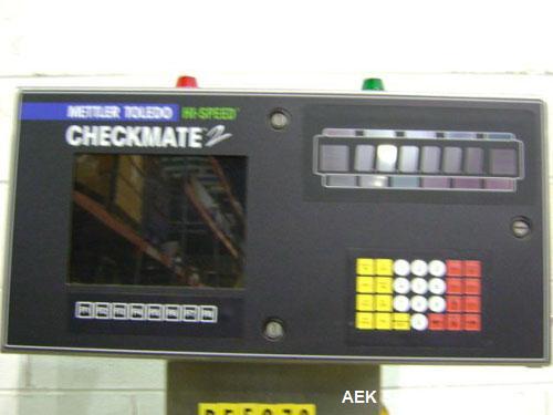 Used Hi-Speed Mettler Toledo Checkweigher, Model CM6400WD-CM. Stainless steel. Side belt driven infeed, and discharge. Approximate 36’’ chain weigh section, weight range up to 20 pounds. Capable of s...