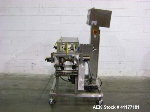 Used Hi-Speed Mettler Toledo Checkweigher, Model CM6400WD-CM. Stainless steel. Side belt driven infeed, and discharge. Approximate 36’’ chain weigh section, weight range up to 20 pounds. Capable of s...