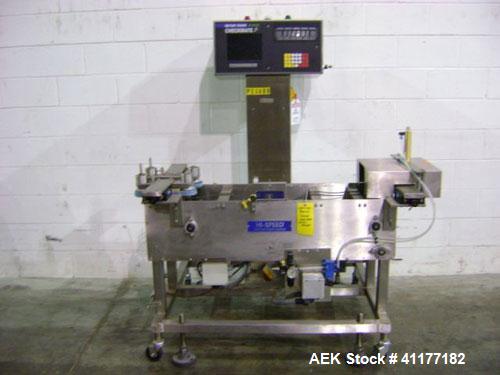 Used Hi-Speed Mettler Toledo Checkweigher, Model CM6400WD-CM. Stainless steel. Side belt driven infeed, and discharge. Approximate 36’’ chain weigh section, weight range up to 20 pounds. Capable of s...