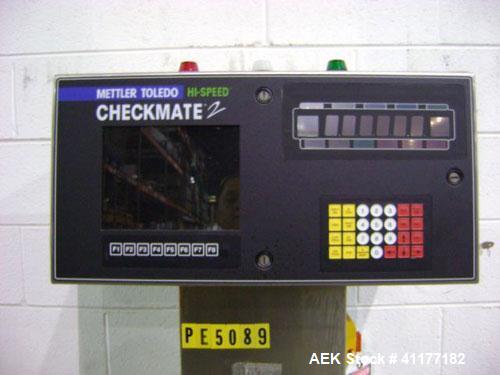 Used Hi-Speed Mettler Toledo Checkweigher, Model CM6400WD-CM. Stainless steel. Side belt driven infeed, and discharge. Approximate 36’’ chain weigh section, weight range up to 20 pounds. Capable of s...