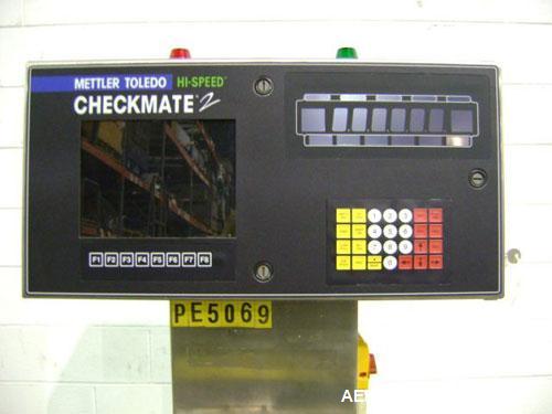 Used Hi-Speed Mettler Toledo Checkweigher, Model CM6400WD-CM. Stainless steel. Side belt driven infeed, and discharge. Approximate 36’’ chain weigh section, weight range up to 20 pounds. Capable of s...