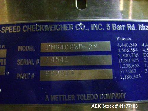 Used Hi-Speed Mettler Toledo Checkweigher, Model CM6400WD-CM. Stainless steel. Side belt driven infeed, and discharge. Approximate 36’’ chain weigh section, weight range up to 20 pounds. Capable of s...