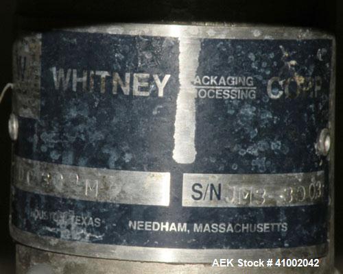 Used Whitney Packaging/Processing Corp Datachek Checkweigher, Model DC-300M. Capable of speeds up to 300 CPM and weights up to 3Kg or 6.6 lbs. Accuracies of +/- 1 gram or .5%. Left to right operation...