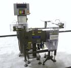Used Mettler Toledo Hi-Speed Micromate Checkweigher, Model CM6300GI-MM. Accuracy from +/- 100 mg. Containers up to 450 cpm, size range: diameter 2-1/2’’ to 10’’, height depends on stability. Equipped...