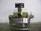Used Hi-Speed Mettler Toledo Checkweigher, Model CM6400WD-CM. Stainless steel. Side belt driven infeed, and discharge. Approximate 36’’ chain weigh section, weight range up to 20 pounds. Capable of s...