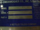 Used Hi-Speed Mettler Toledo Checkweigher, Model CM6400WD-CM. Stainless steel. Side belt driven infeed, and discharge. Approximate 36’’ chain weigh section, weight range up to 20 pounds. Capable of s...