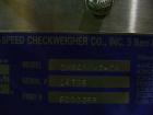 Used Hi-Speed Mettler Toledo Checkweigher, Model CM6400WD-CM. Stainless steel. Side belt driven infeed, and discharge. Approximate 36’’ chain weigh section, weight range up to 20 pounds. Capable of s...