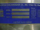 Used Hi-Speed Mettler Toledo Checkweigher, Model CM6400WD-CM. Stainless steel. Side belt driven infeed, and discharge. Approximate 36’’ chain weigh section, weight range up to 20 pounds. Capable of s...
