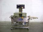 Used Hi-Speed Mettler Toledo Checkweigher, Model CM6400WD-CM. Stainless steel. Side belt driven infeed, and discharge. Approximate 36’’ chain weigh section, weight range up to 20 pounds. Capable of s...