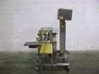Used Hi-Speed Mettler Toledo Checkweigher, Model CM6400WD-CM. Stainless steel. Side belt driven infeed, and discharge. Approximate 36’’ chain weigh section, weight range up to 20 pounds. Capable of s...