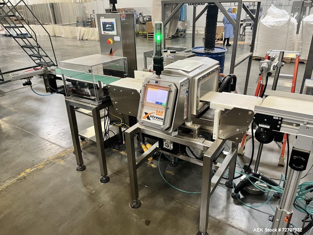 Used Eriez Magnetics Conveyor Mounted Metal Detector, Model Xtreme. Approximate aperture size 12" wide x 5" tall. 8" wide belt.