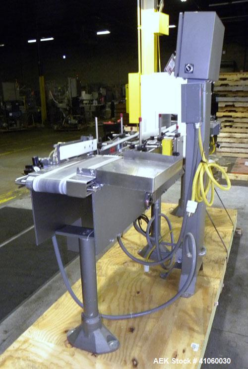 Used Mettler-Toledo Hi-Speed Checkweigher / Metal Detector combination, , Model CM60MM-BT, Serial #10518. Capacity 50 pounds, last running 1661 gram containers at 20 to 60 pieces per minute. (2) Sile...