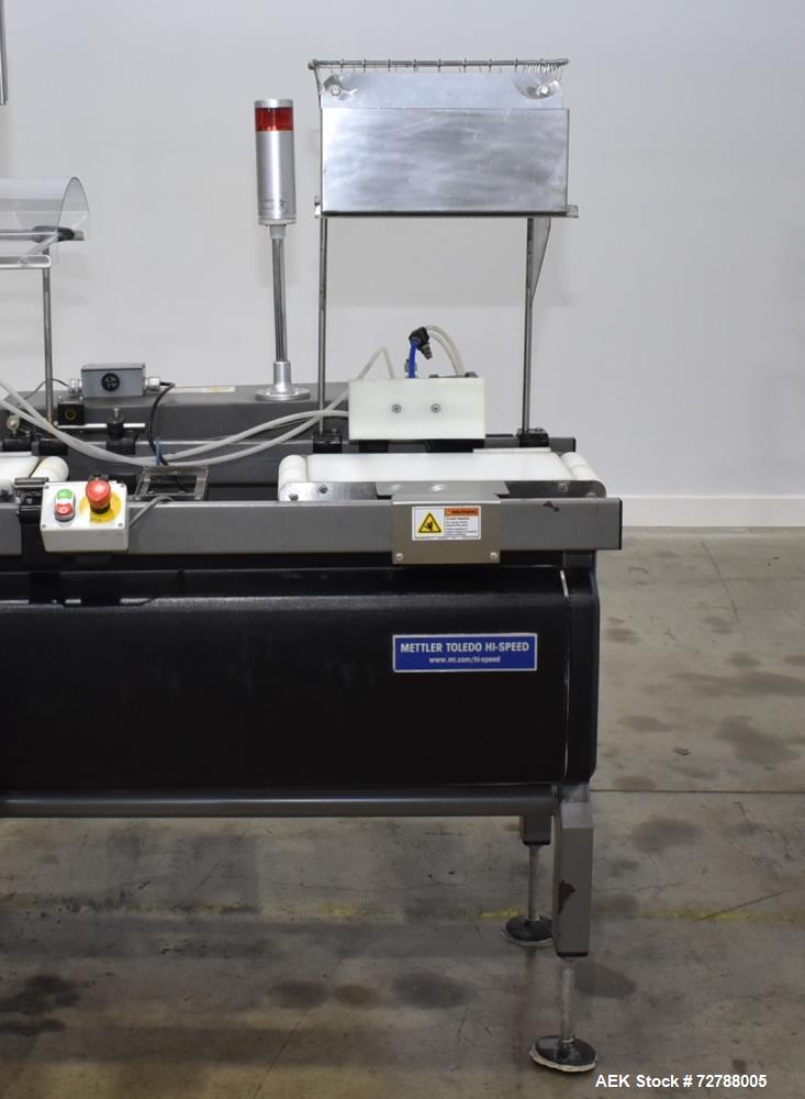 Used Mettler-Toledo Safeline Hi-Speed Model XE Combination Metal Detector and Checkweigher. Capable of speeds up to 500 packages per minute. Capable of weighing product up to 7kg. Approximate 7-3/4" ...