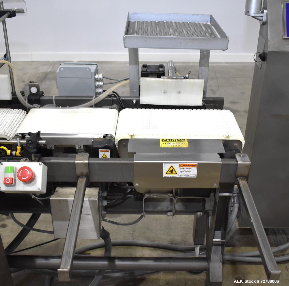 Used- Mettler-Toledo Safeline Hi-Speed Model XE Combination Metal Detector and Checkweigher. Capable of speeds up to 500 pac...