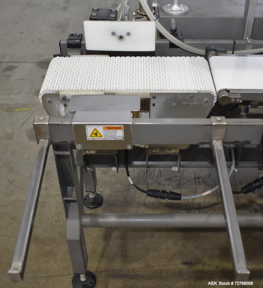 Used Mettler-Toledo Safeline Hi-Speed Model XE Combination Metal Detector and Checkweigher. Capable of speeds up to 500 packages per minute. Capable of weighing product up to 7kg. Approximate 7-3/4" ...