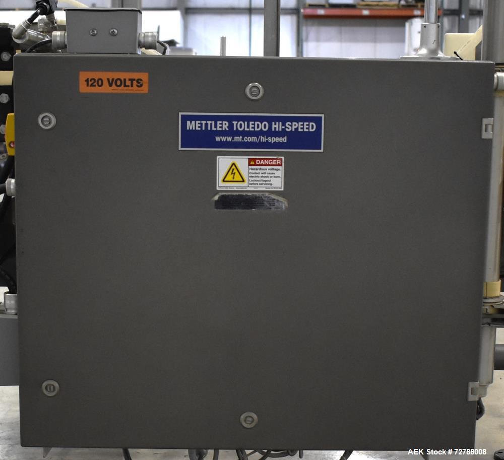 Used Mettler-Toledo Safeline Hi-Speed Model XE Combination Metal Detector and Checkweigher. Capable of speeds up to 500 packages per minute. Capable of weighing product up to 7kg. Approximate 7-3/4" ...