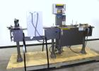 Used Mettler-Toledo Hi-Speed Checkweigher / Metal Detector combination, , Model CM60MM-BT, Serial #10518. Capacity 50 pounds, last running 1661 gram containers at 20 to 60 pieces per minute. (2) Sile...