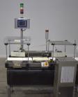 Used- Mettler-Toledo Safeline Hi-Speed Model XE Combination Metal Detector and Checkweigher. Capable of speeds up to 500 pac...