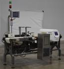 Used Mettler-Toledo Safeline Hi-Speed Model XE Combination Metal Detector and Checkweigher. Capable of speeds up to 500 packages per minute. Capable of weighing product up to 7kg. Approximate 7-3/4