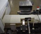 Used Mettler-Toledo Safeline Hi-Speed Model XE Combination Metal Detector and Checkweigher. Capable of speeds up to 500 packages per minute. Capable of weighing product up to 7kg. Approximate 7-3/4