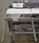 Used Mettler-Toledo Safeline Hi-Speed Model XE Combination Metal Detector and Checkweigher. Capable of speeds up to 500 packages per minute. Capable of weighing product up to 7kg. Approximate 7-3/4