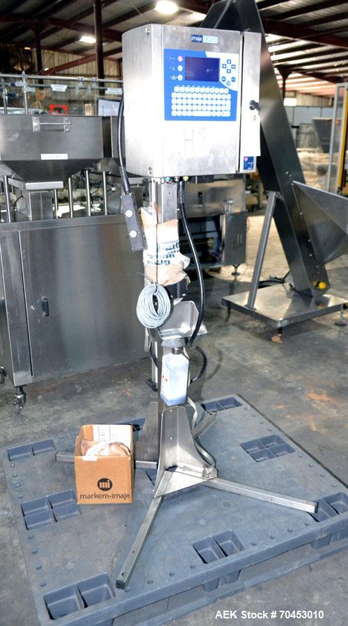 Used Imaje 9020 small character ink jet coder. Up to 4 line printing. Print speeds up to 4.4 m/s or (1,090 ft/min). Mounted on stand. Character height from 0.7mm to 18.2mm. SELLING PRICE, AS IS, WHER...