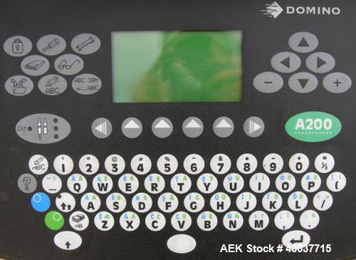 Used Domino A200 Small Character Ink Jet Coder, Model A200. Can print up to four lines of type with a variety of print formats including logos, bar codes, automatic serial numbering/batch coding. Hig...