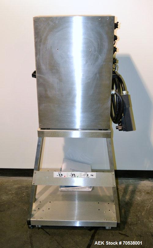 Unused- Domino A200 Small Character Ink Jet Coder, Model A200. Can print up to four lines of type with a variety of print formats including logos, bar codes, automatic serial numbering/batch coding. ...
