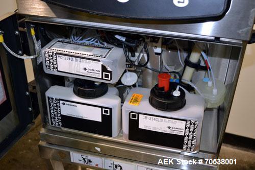 Unused- Domino A200 Small Character Ink Jet Coder, Model A200. Can print up to four lines of type with a variety of print formats including logos, bar codes, automatic serial numbering/batch coding. ...