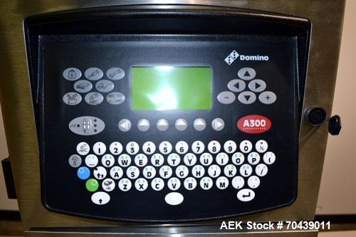 Unused- Domino Model A300 Ink Jet Coder. Includes a print head. 316 Stainless Steel construction. Machine has flexible applications with up to 4 lines in a variety of print formats.