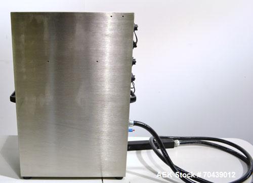 Unused- Domino Model A300 Ink Jet Coder. Includes a print head. 316 Stainless Steel construction. Machine has flexible applications with up to 4 lines in a variety of print formats.
