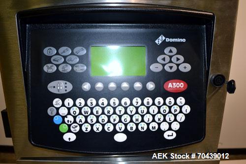 Unused- Domino Model A300 Ink Jet Coder. Includes a print head. 316 Stainless Steel construction. Machine has flexible applications with up to 4 lines in a variety of print formats.