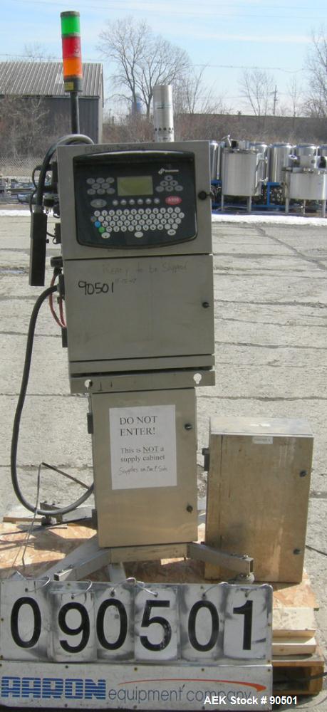 USED: Domino ink jet coder, model A300. Designed for 4 line printing in a harsh environment. Stainless steel cabinet with touch screen. Mounted on casters.