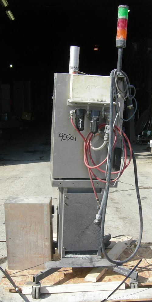 USED: Domino ink jet coder, model A300. Designed for 4 line printing in a harsh environment. Stainless steel cabinet with touch screen. Mounted on casters.